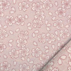 papier pour le cartonnage nommé hanami imprimé de fleurs de cerisier stylisées rouge sur fond crème