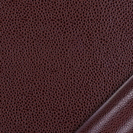 papier simili cuir au motif galuchat marron clair dont l’aspect et le toucher sont proches des cuirs exotiques.